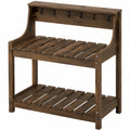 Banco da lavoro per giardinaggio 110 x 50 x 150 cm in legno marrone con ripiani e ganci